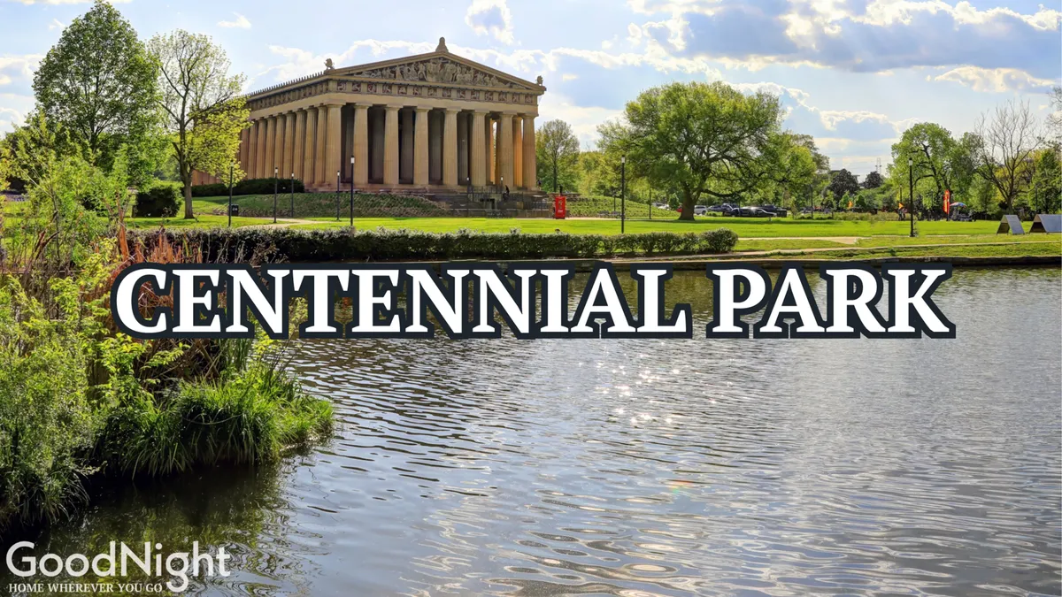 The image captures The Parthenon-like structure in Centennial Park, reflected on a calm lake surrounded by lush greenery. The park is vibrant, inviting for leisurely walks or romantic picnics, and the iconic Parthenon serves as a cultural and historical centerpiece.