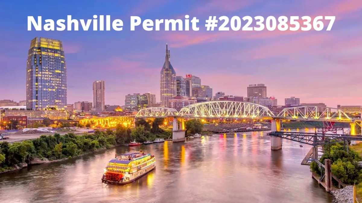 A sweeping city view of the Nashville skyline with bridges, a riverboat, and city lights. The lively waterfront scene captures the energy and appeal of Nashville, suggesting both productivity and the opportunity for after-hours exploration.